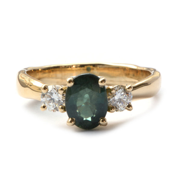 Delphine ring met groene saffier