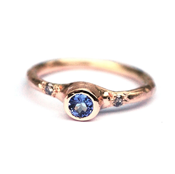 Rosegouden ring met tanzaniet en diamantjes
