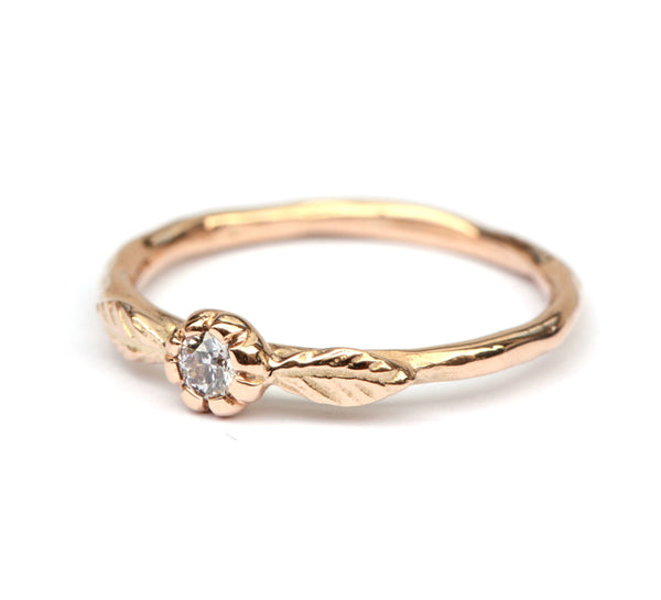 Rosegouden ring met natural light pink diamant