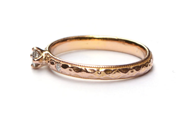Verlovingsring van roodgoud met diamanten