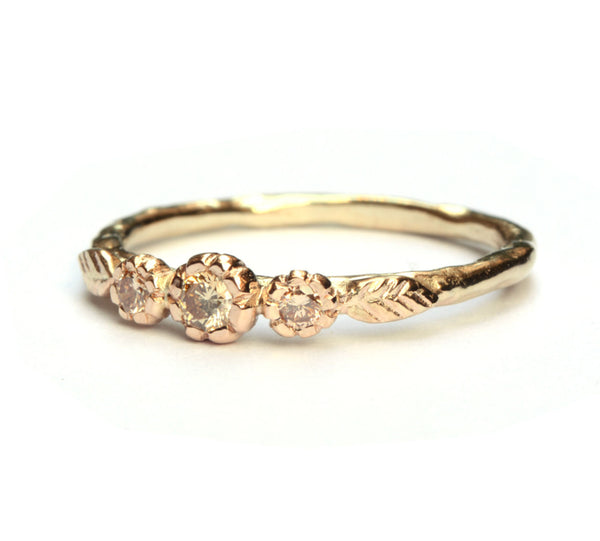 Rosegouden bloemenring met peach diamant