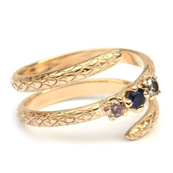 Slangenring met diamant en saffier