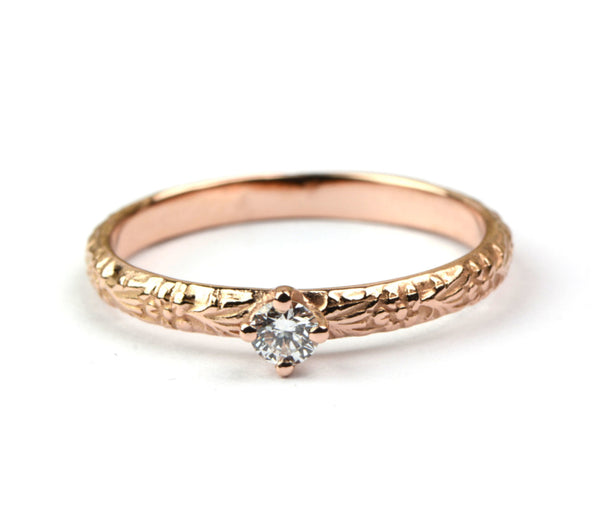 Roodgouden bloemenring met diamant