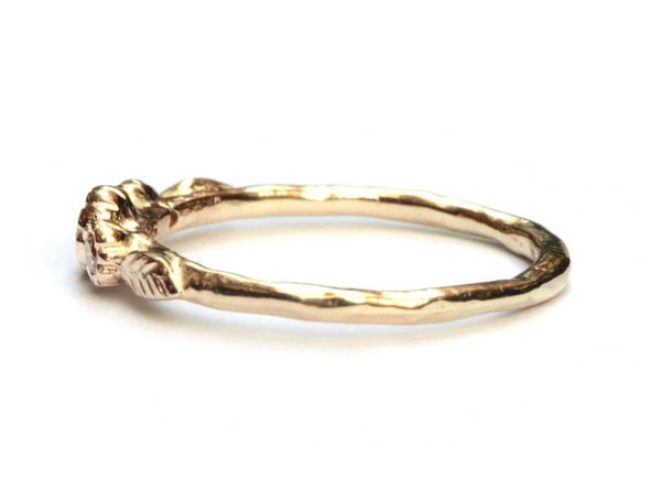 Rosegouden bloemenring met peach diamant