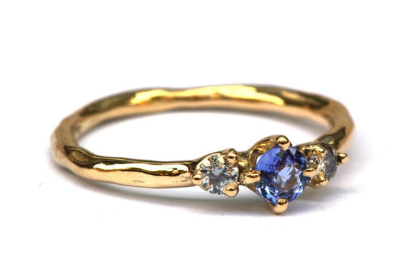 Ring met tanzaniet en grijze diamanten