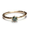 Ring met groene diamant