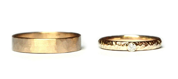 Trouwringenset met veermotief en diamant