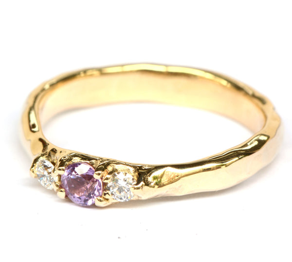 Robuuste ring met paarsroze toermalijn en witte diamanten