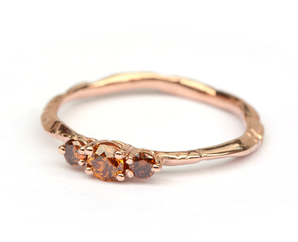 Roodgouden ring met cognackleurige diamanten