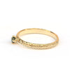 Bloemmotief ring met mintgroene diamant