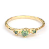 Verlovingsring met groenen diamanten