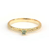 Bloemmotief ring met mintgroene diamant