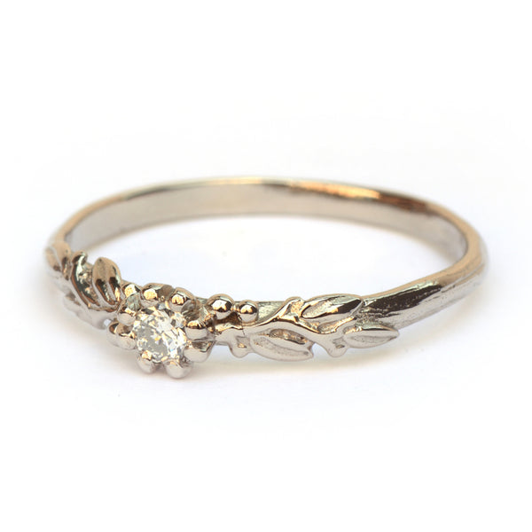 Ring Rosa Nora in witgoud