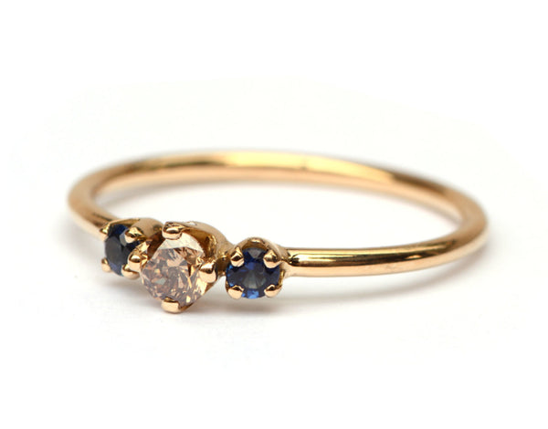 Ring met bruine diamant en saffier
