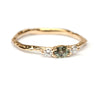Ring met ovale groene saffier en diamanten