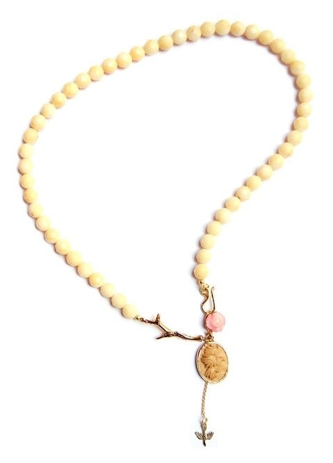 Koraalcollier met lava vogel in goud
