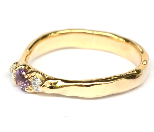 Robuuste ring met paarsroze toermalijn en witte diamanten