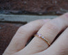 Fijne ring met roze saffier en paarse diamantjes
