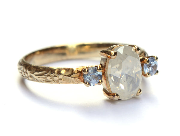 Verlovingsring met opaaldiamant en ice blue saffieren