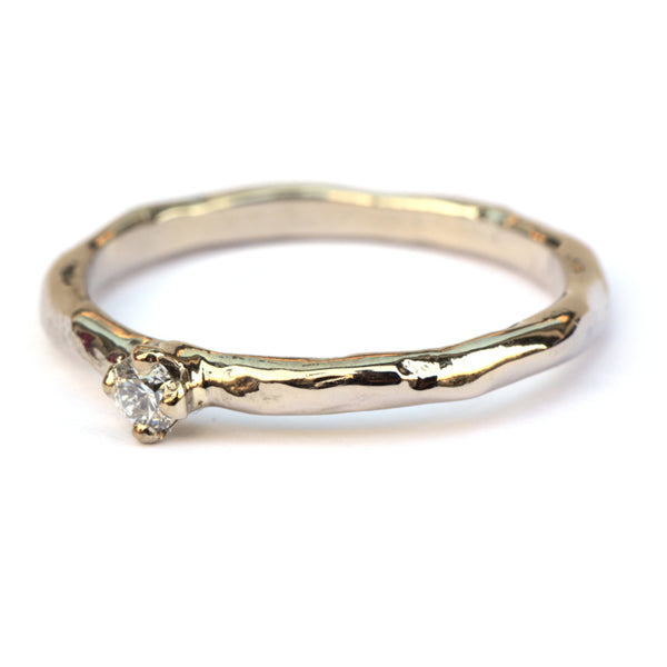 Witgouden organische verlovingsring met diamant
