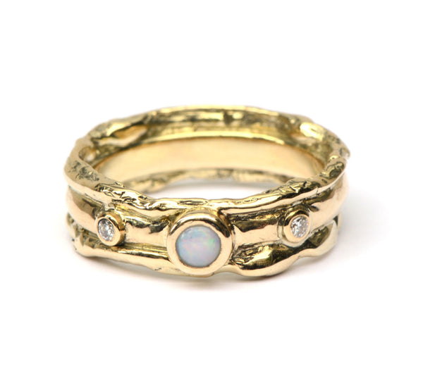 Trouwring met opaal en diamant