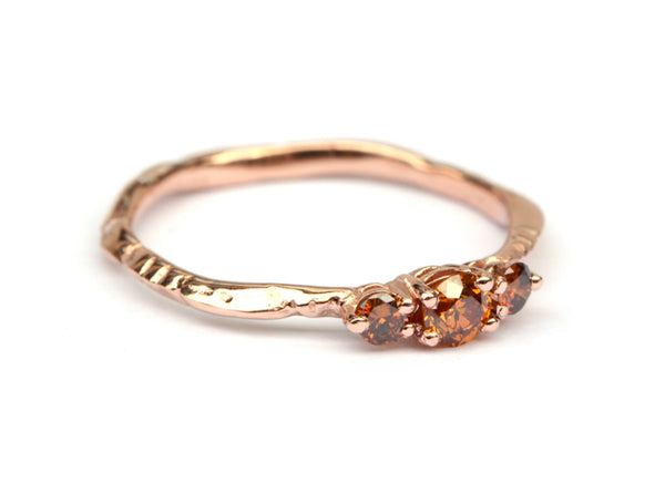 Roodgouden ring met cognackleurige diamanten