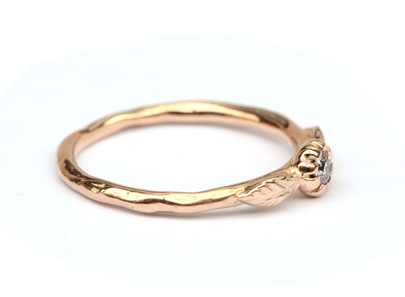 Rosegouden ring met natural light pink diamant