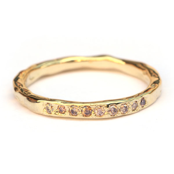 Grillige aanschuifring met 9 pinkish brown diamanten